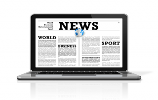 SFS in the news on laptop