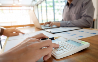 calculating vat and tax when operating two companies